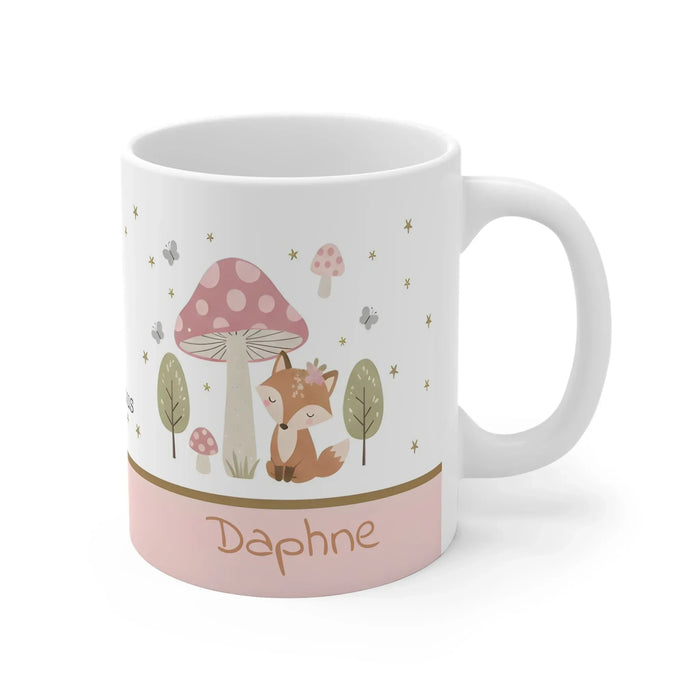 White ceramic mug with woodland fox under mushrooms, personalized 'Daphne' on pink band