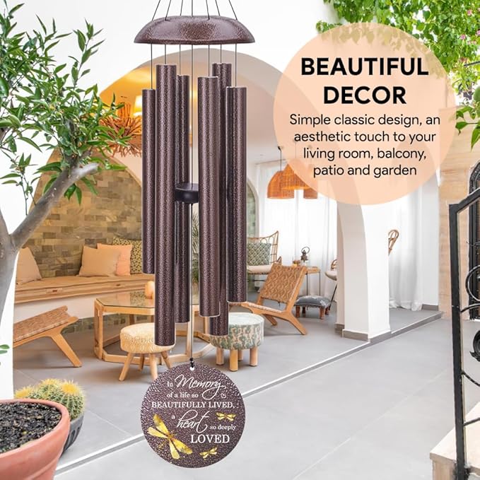 Bronze-tone dragonfly wind chime with multiple tubes and round medallion reading "In Loving Memory".