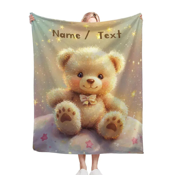 Personalized teddy bear throw blanket with 'Name / Text' and paw-print stars
