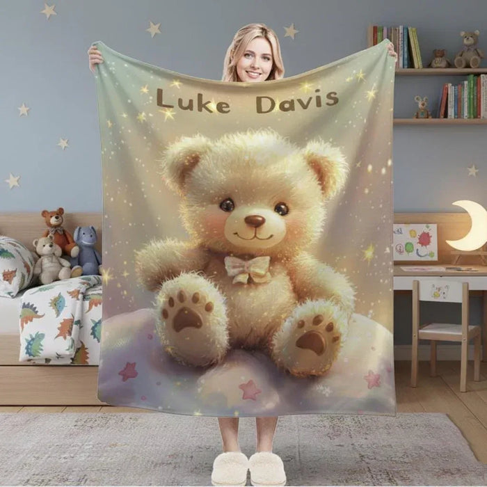 Personalized teddy bear throw blanket with 'Luke Davis' and star accents