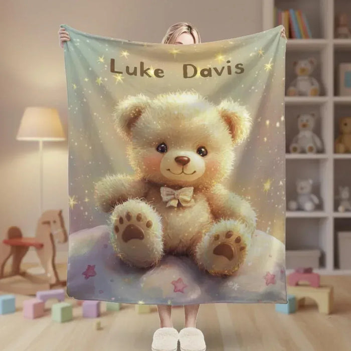 Personalized teddy bear throw blanket with 'Luke Davis' centerpiece and stars