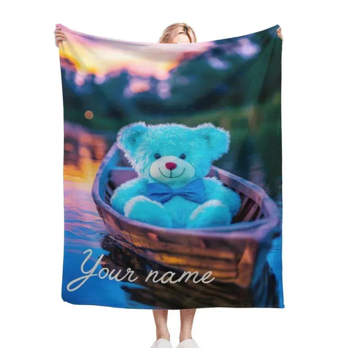 Flannel fleece throw blanket with blue bear in canoe and night-sky artwork
