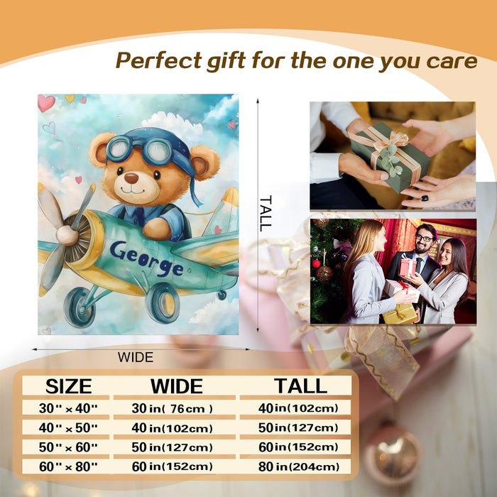 Gift layout featuring a pilot teddy bear blanket with blue airplane and George lettering