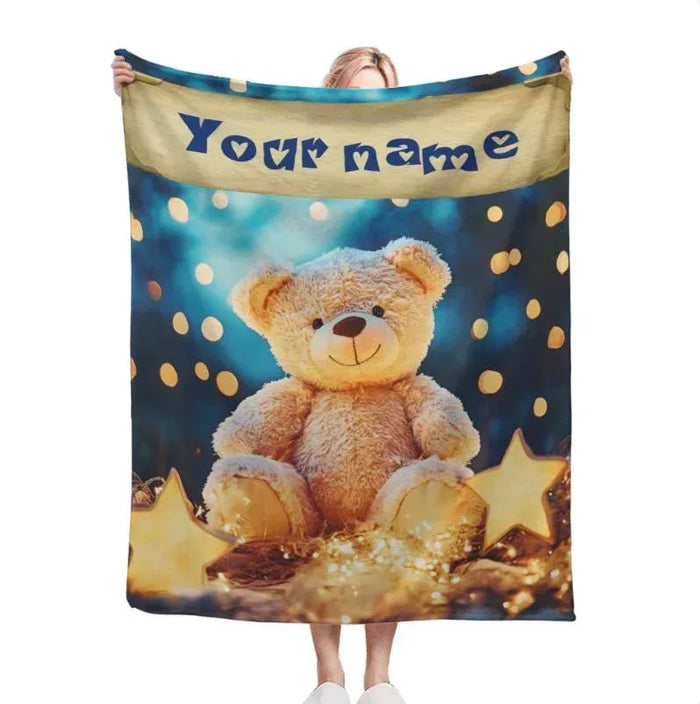 Teddy bear plush blanket with blue night sky print, teddy bear, yellow name band