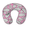 Pink and white leaf patterned travel neck pillow, U-shaped with center opening