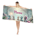 Personalized unicorn beach towel, light gray with pink name “Name” and unicorn figures
