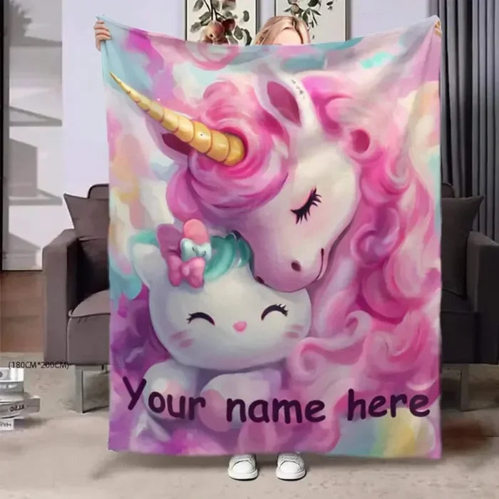 Personalized unicorn and cat fleece blanket with 'Your name here' printed across bottom
