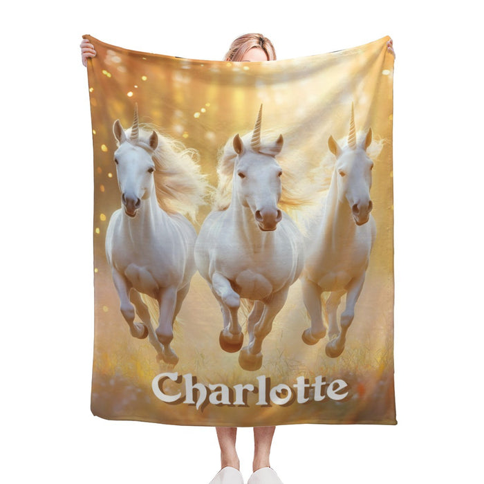 Personalized blanket featuring three white horses and the name “Charlotte”