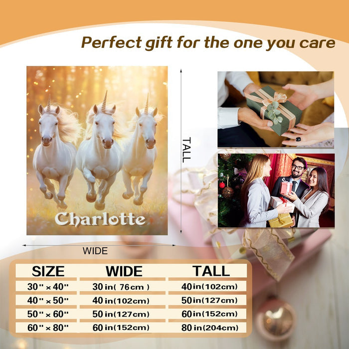 Personalized unicorn name blanket with three white horses and “Charlotte”