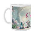 White ceramic mug with handle; unicorn kittens in a forest scene and partial Kiara text
