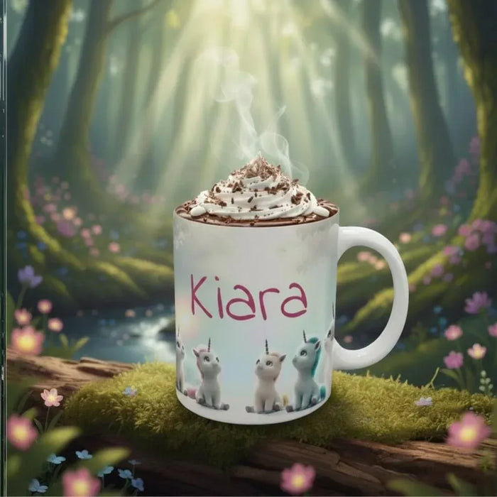 White ceramic coffee mug with handle; Kiara name and three unicorn kittens print