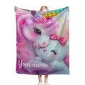 Personalized unicorn plush blanket with pastel face and 'Your name' text