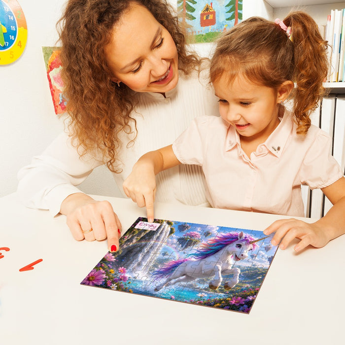 Two children helping assemble a unicorn jigsaw puzzle on a table with wooden pieces