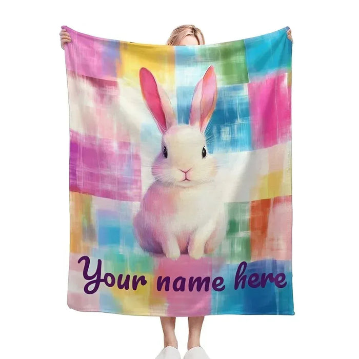Personalized rainbow bunny blanket with pink ears and “Your name here” text