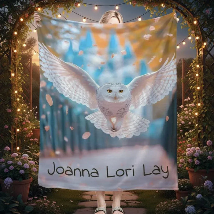 Personalized fleece throw blanket with winged owl graphic and name text, soft blue