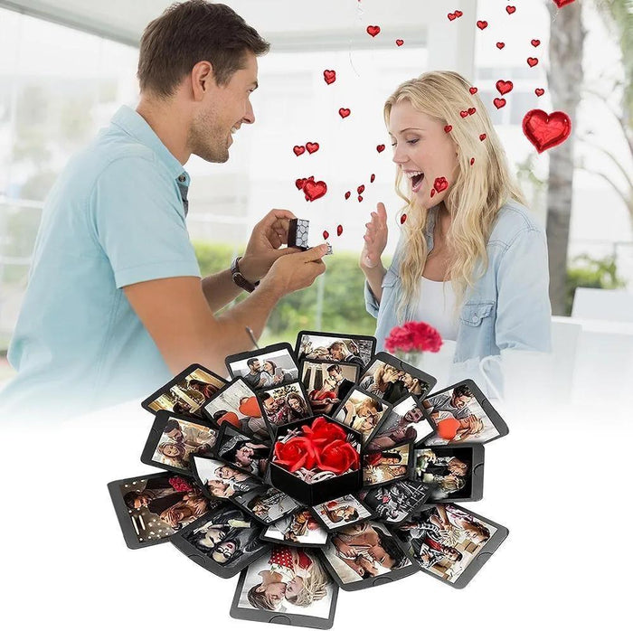 Photo explosion surprise box with fanned photo prints in front of a couple