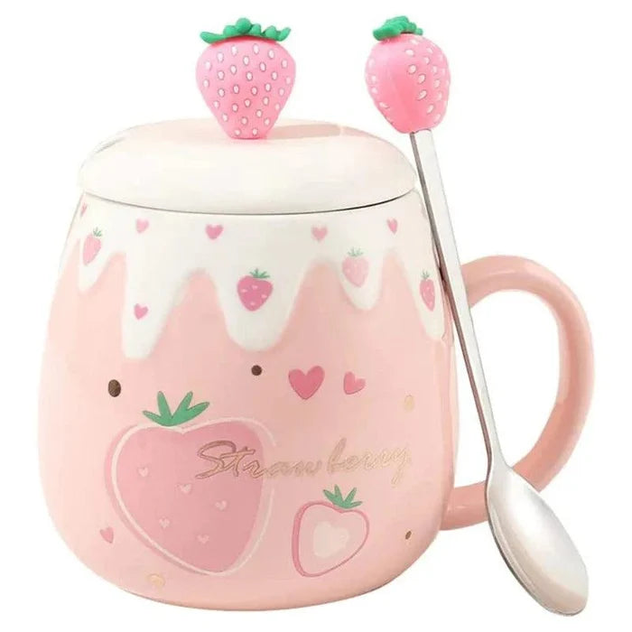 Pink ceramic mug with white lid and strawberry topper; spoon attached; strawberry heart print