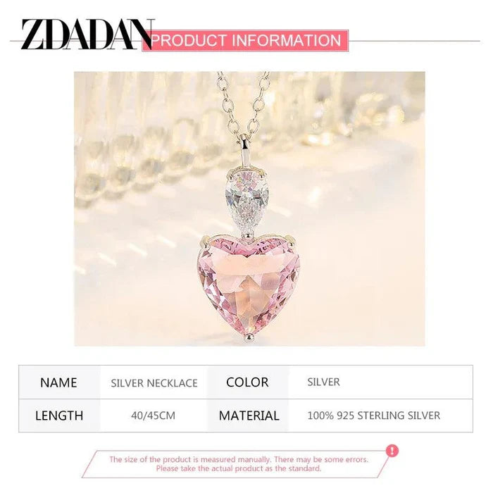 Silver zircon heart pendant necklace with pink heart and clear teardrop centerpiece