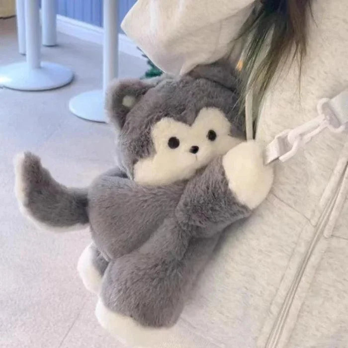 Plush crossbody bag with grey puppy plush, cream muzzle, clasp strap and chain