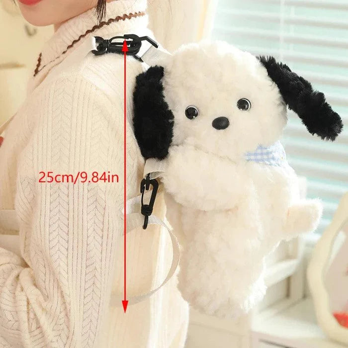 Plush crossbody bag with white puppy face, black ears, blue bandana, clip strap