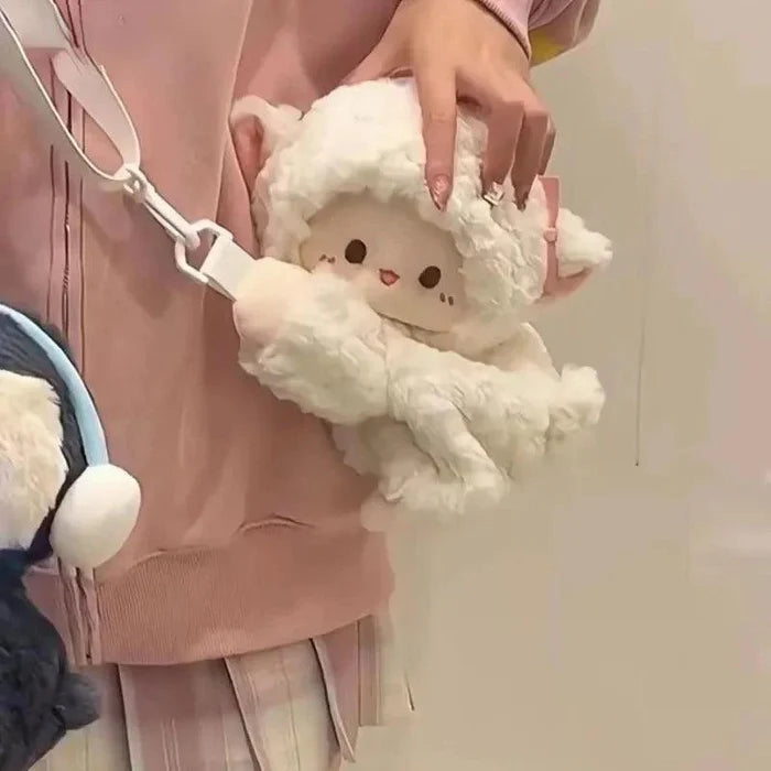 Cream plush lamb crossbody bag, front view with white adjustable strap and face