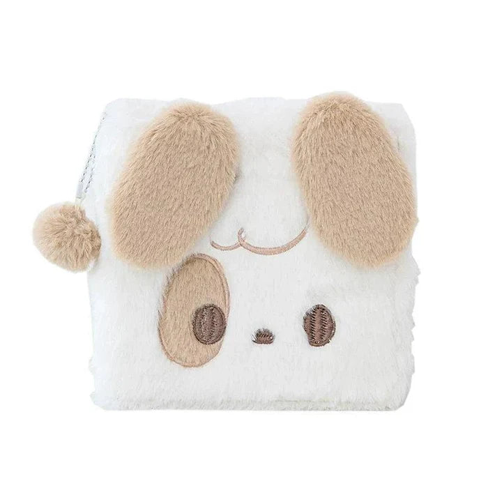 Tan plush puppy notebook cover with embroidered eyes, nose, and fuzzy ears