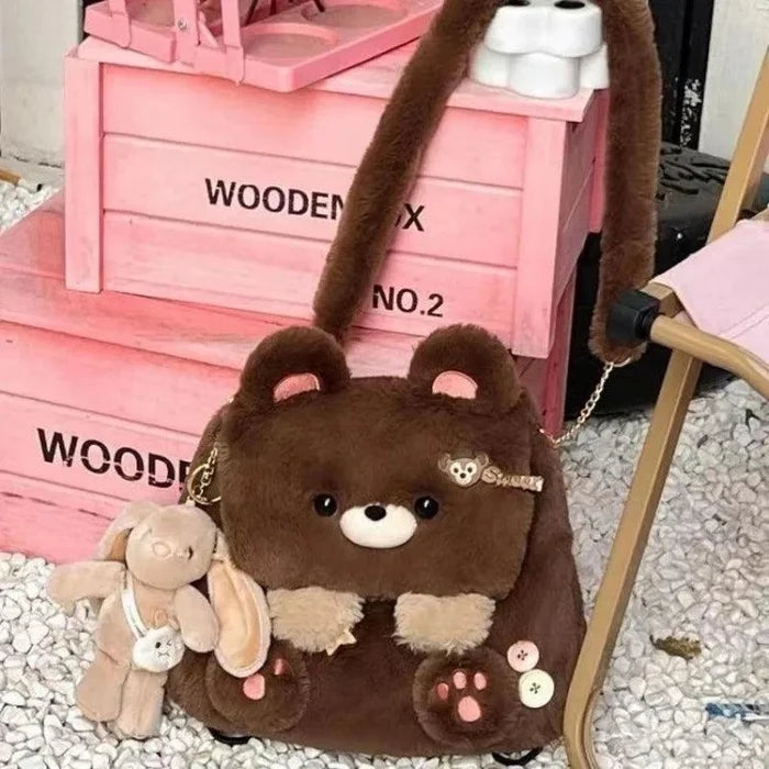 Brown teddy bear backpack bag with bear face, paw patch, dangling bunny