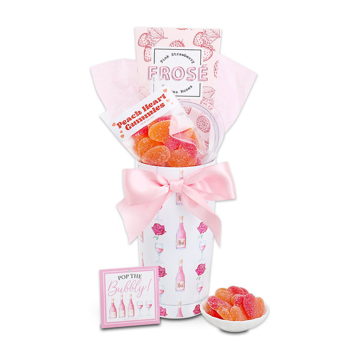 FROSE tumbler gift set with pink bow, gummy pieces, and snack pouch