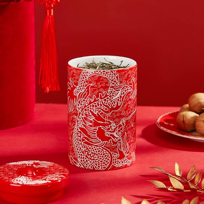 Red porcelain canister with white dragon pattern and lid