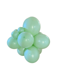 Pastel green latex balloon cluster with multiple glossy balloons tied together