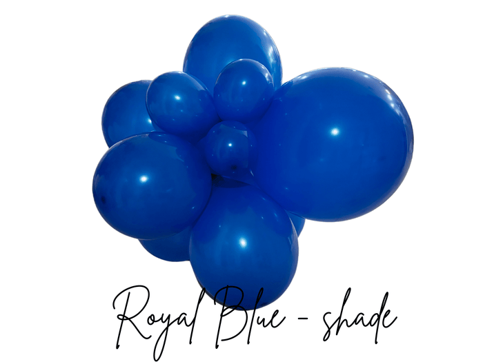 Royal blue latex balloon cluster with multiple glossy balloons, angled view
