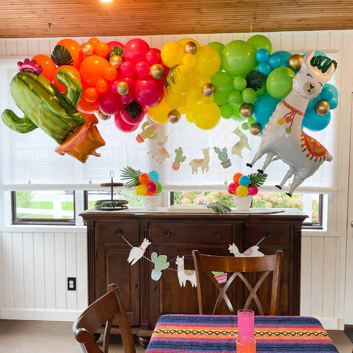 Latex balloon cluster with mixed yellow, orange, red, green, and blue balloons