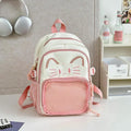 Pink ita-style school backpack front view with cat-face design and mesh pocket