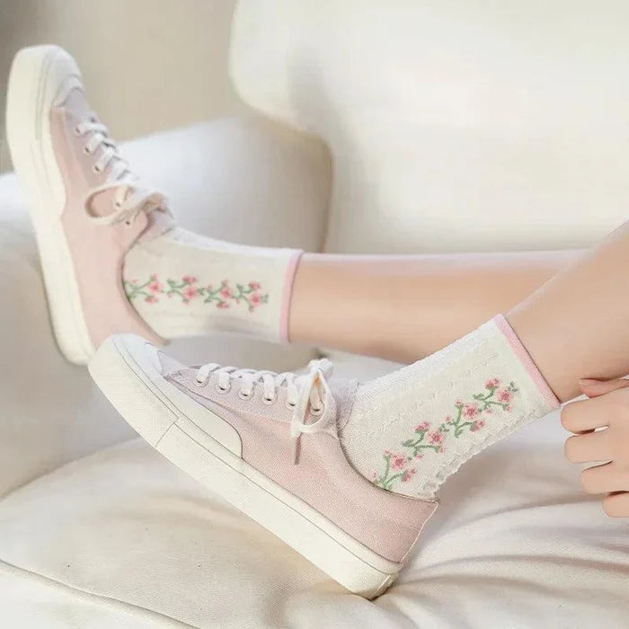 Pink-trim white crew socks with small floral print