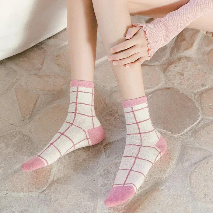 Pink-and-white grid crew socks with solid pink cuffs