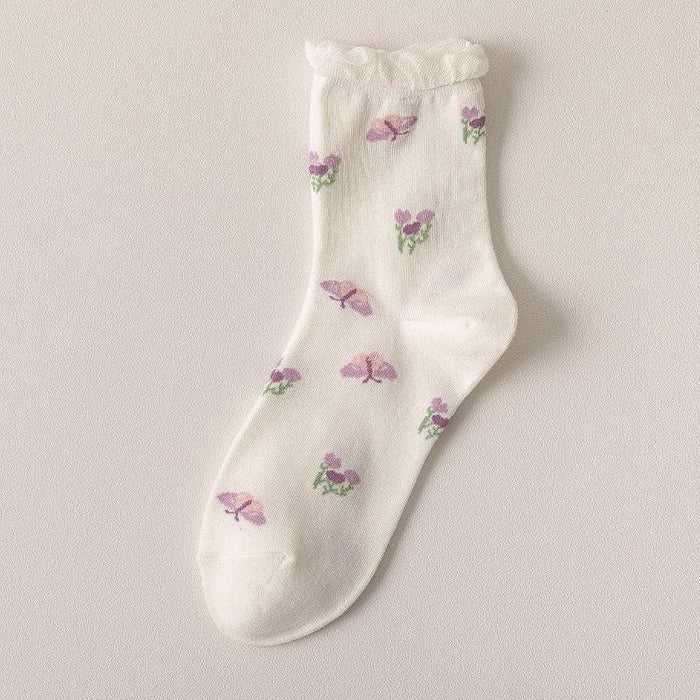 White floral ankle socks with purple and green small flower print, ruffled cuff