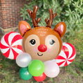 Reindeer balloon bouquet with brown reindeer head, antlers, and red-and-white peppermint balloons