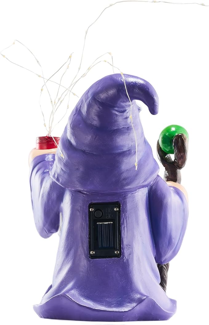Purple gnome statue back view with solar panel, glowing solar LED string lights