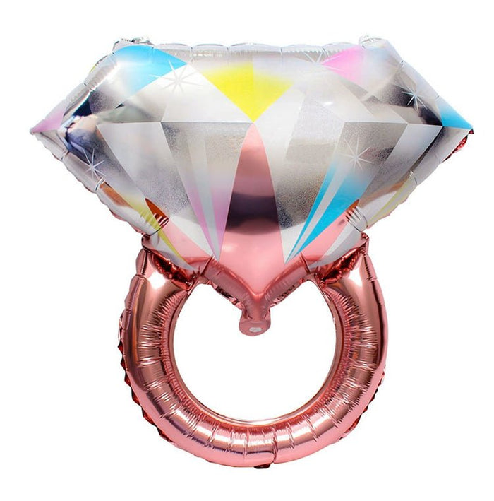 Rose gold ring-shaped balloon with shiny faceted multicolor heart topper