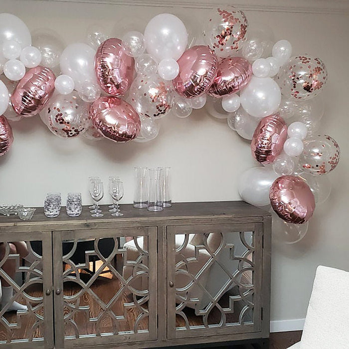 Balloon garland with white and rose gold metallic balloons and eucalyptus greenery