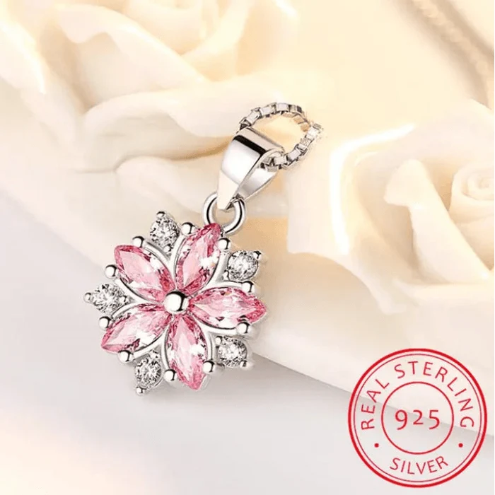 Silver-toned pendant necklace with pink flower charm, clasp and Real Sterling 925 seal