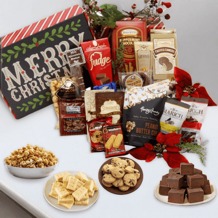 Large Christmas candy gift box with assorted chocolates and cookies, open and wrapped