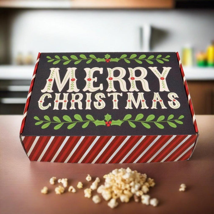 Christmas gift box lid with “Merry Christmas” design, striped red and white sides