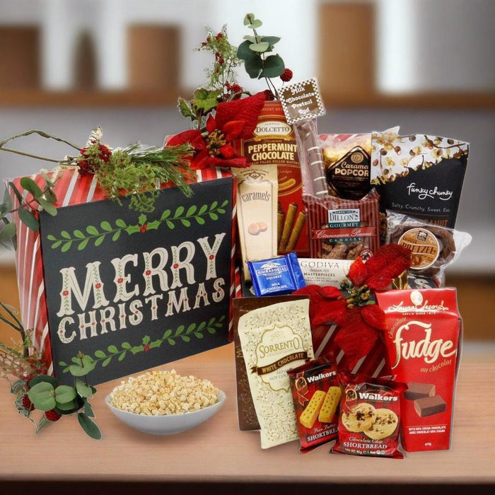 Christmas gift box with striped red lining, filled with assorted chocolates, open