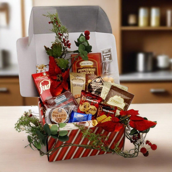 Christmas gift box with red-and-white striped wrap and ribbon, open with chocolates