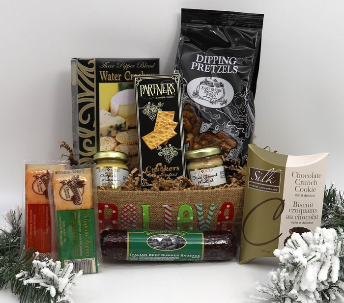Assorted snack gift basket with pretzels, crackers, cookies, and chocolate treats