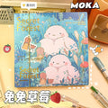 Blue illustrated notebook cover with large polar-bear character in a forest scene