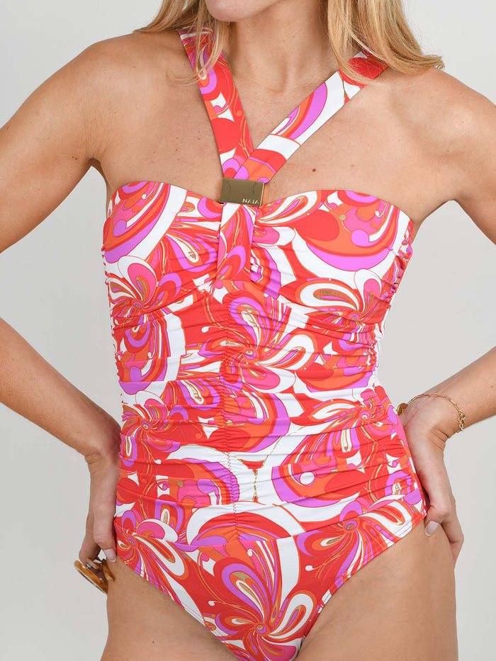 Model wearing the Selene swimsuit  in Dolce Vita print by NAIA Beach
