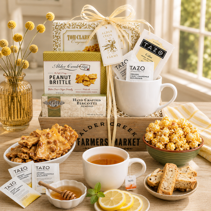 Tea gift basket: wooden crate, white mug, TAZO tea packets, peanut brittle, cookies