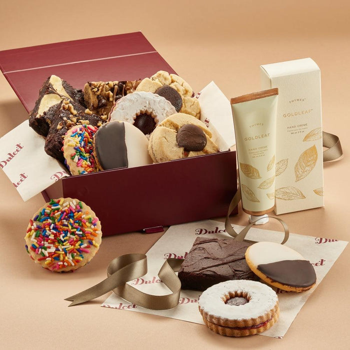 Gift set box with assorted cookies and a Goldleaf hand cream tube